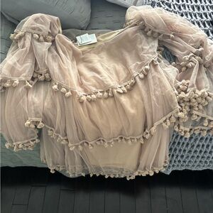 Sheer Ruffle Blouse with Pom Pom Details